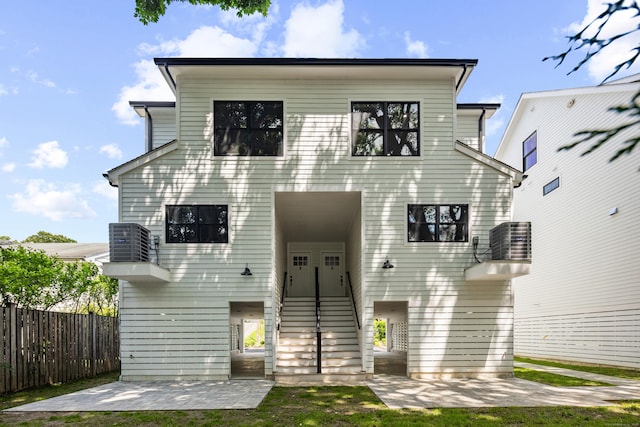 26 Homestead Ln Unit B, Greenwich, CT 06831 - view of front of house with central AC unit, stairway, and a patio
