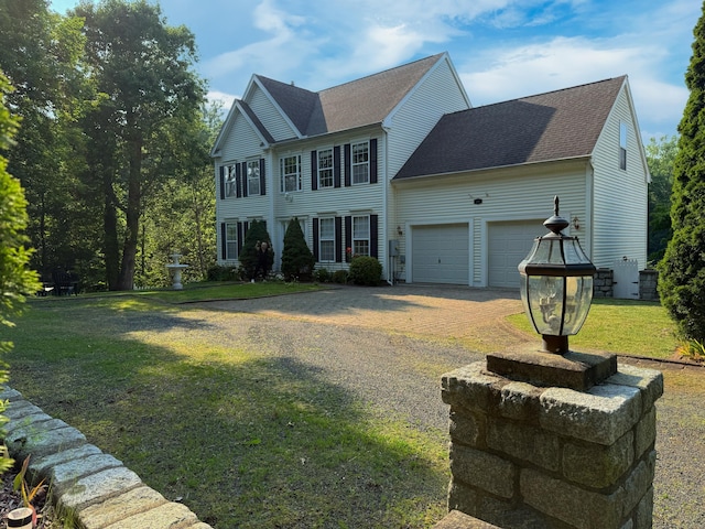 29 Swift St, Branford, CT 06405 - colonial-style house with driveway, an attached garage, a front yard, and a shingled roof