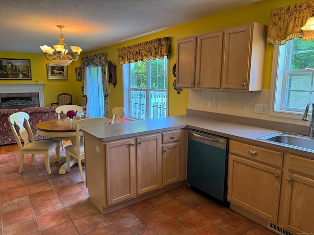 29 Swift St, Branford, CT 06405 - kitchen featuring dishwasher, a chandelier, healthy amount of natural light, a peninsula, and a textured ceiling