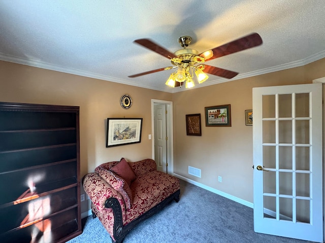 29 Swift St, Branford, CT 06405 - living area with a ceiling fan, carpet floors, crown molding, a textured ceiling, and baseboards