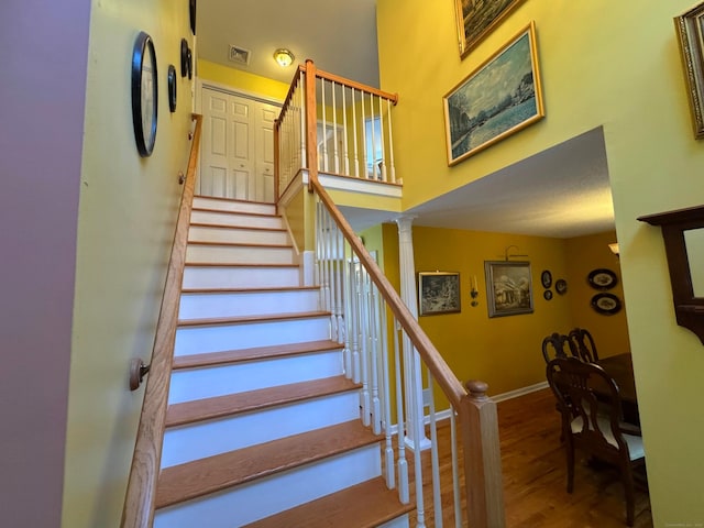 29 Swift St, Branford, CT 06405 - stairway featuring wood finished floors and a high ceiling