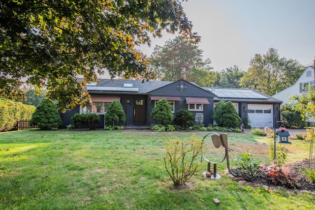 20 Marlin Rd, New Britain, CT 06053 - view of front of property featuring an attached garage and roof mounted solar panels