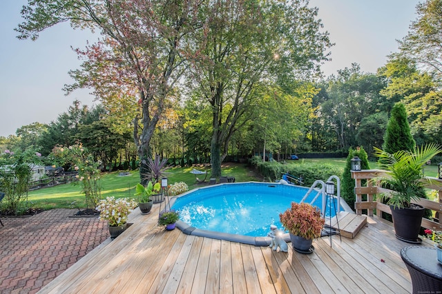 20 Marlin Rd, New Britain, CT 06053 - outdoor pool featuring a yard, a deck, and view of wooded area