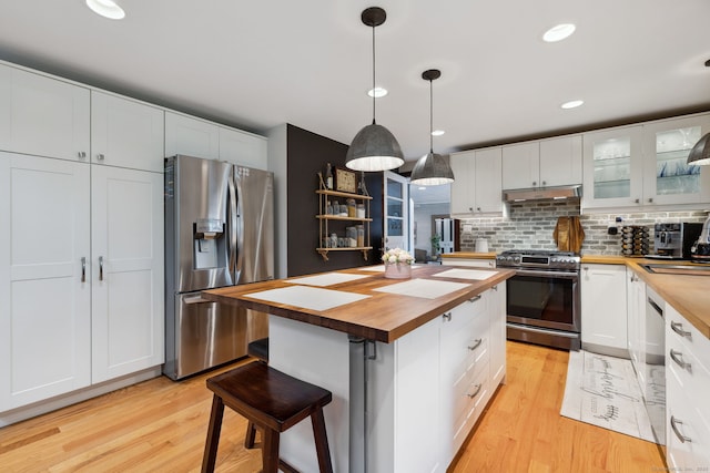 20 Marlin Rd, New Britain, CT 06053 - kitchen with stainless steel appliances, wooden counters, light wood-style flooring, white cabinetry, and recessed lighting