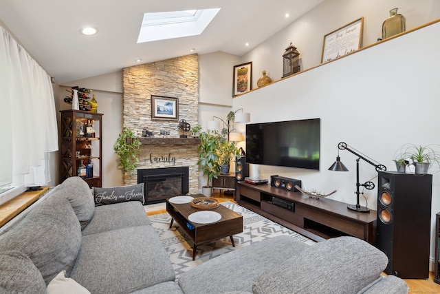 20 Marlin Rd, New Britain, CT 06053 - living area with a skylight, wood finished floors, vaulted ceiling, a fireplace, and recessed lighting
