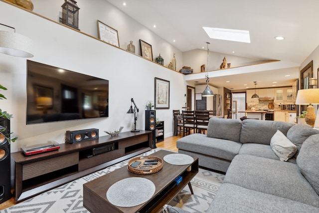 20 Marlin Rd, New Britain, CT 06053 - living area featuring a skylight, lofted ceiling, recessed lighting, and light wood finished floors