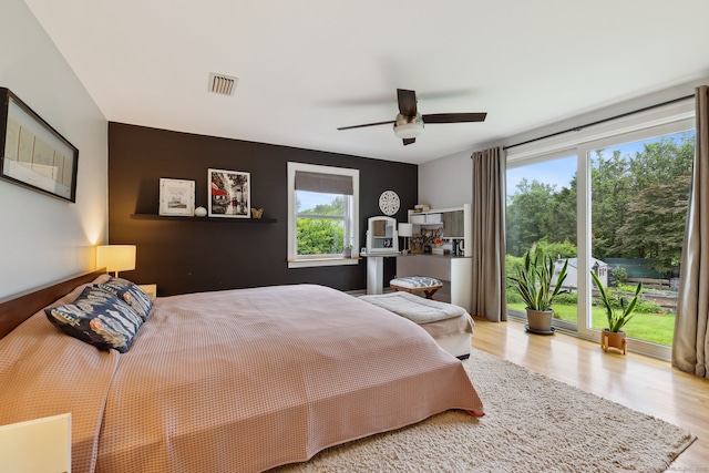 20 Marlin Rd, New Britain, CT 06053 - bedroom featuring wood finished floors, access to exterior, and a ceiling fan