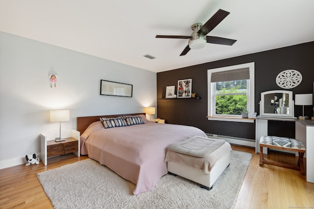 20 Marlin Rd, New Britain, CT 06053 - bedroom with a baseboard radiator, light wood-type flooring, ceiling fan, and baseboards