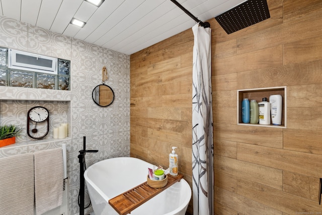 20 Marlin Rd, New Britain, CT 06053 - full bathroom with wood walls, a soaking tub, and a tile shower