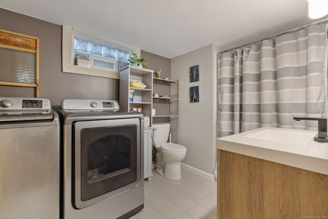 20 Marlin Rd, New Britain, CT 06053 - laundry room with washing machine and dryer and baseboards