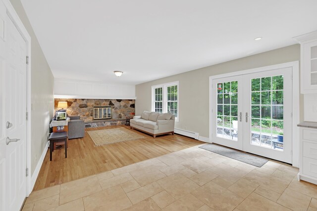 19 Maplecrest Dr, Danbury, CT 06811 - living room with french doors, baseboard heating, light wood-style flooring, and recessed lighting