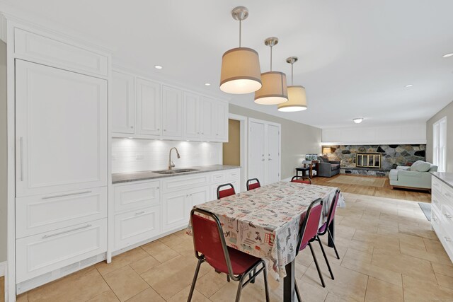 19 Maplecrest Dr, Danbury, CT 06811 - dining space featuring recessed lighting, a fireplace, and light tile patterned floors