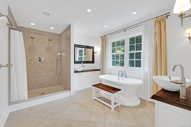 19 Maplecrest Dr, Danbury, CT 06811 - full bathroom with vanity, a stall shower, a freestanding tub, tile patterned floors, and recessed lighting