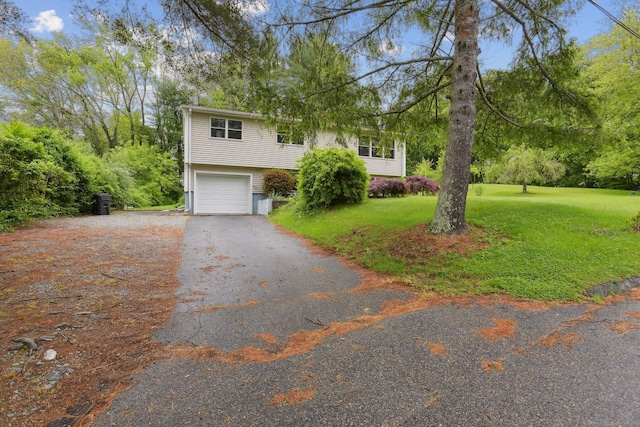 6 Royal Oaks Dr, Ledyard, CT 06339 - view of front of property featuring asphalt driveway, an attached garage, and a front lawn