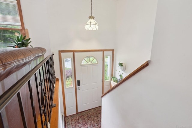 6 Royal Oaks Dr, Ledyard, CT 06339 - entryway featuring baseboards and a high ceiling
