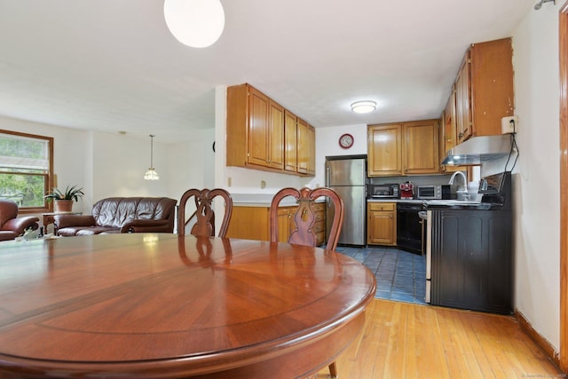 6 Royal Oaks Dr, Ledyard, CT 06339 - dining area with light wood finished floors