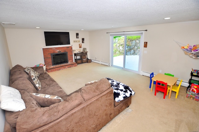 59 Settlers Knl, Newington, CT 06111 - living area featuring a textured ceiling, carpet flooring, a fireplace, a baseboard radiator, and recessed lighting