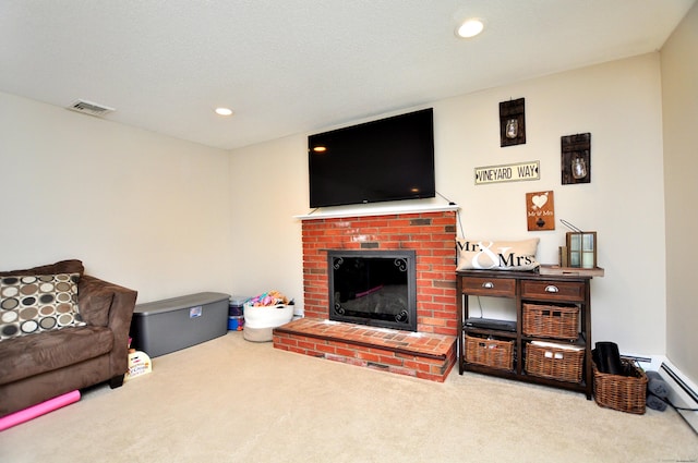 59 Settlers Knl, Newington, CT 06111 - carpeted living area with a fireplace, recessed lighting, and a baseboard heating unit