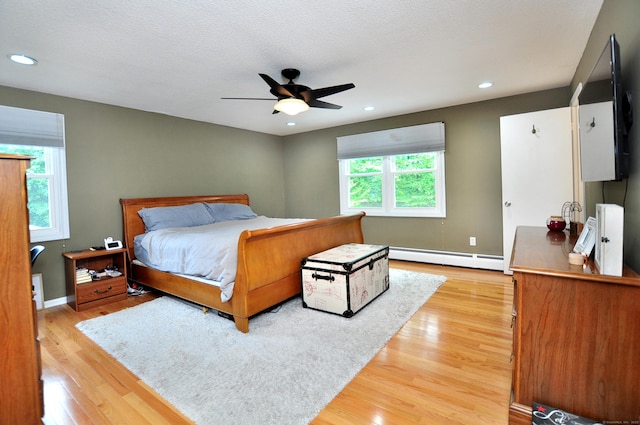 59 Settlers Knl, Newington, CT 06111 - bedroom featuring a baseboard heating unit, light wood-type flooring, recessed lighting, baseboards, and a ceiling fan