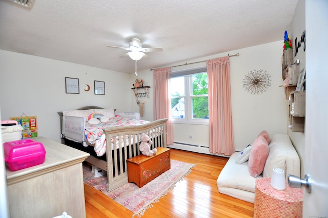 59 Settlers Knl, Newington, CT 06111 - bedroom featuring light wood finished floors, ceiling fan, and a textured ceiling