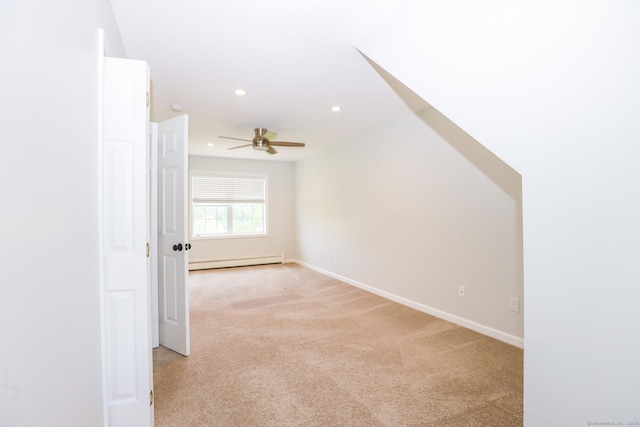 527 Highland Ave, Torrington, CT 06790 - unfurnished room featuring a baseboard heating unit, a ceiling fan, recessed lighting, light colored carpet, and baseboards