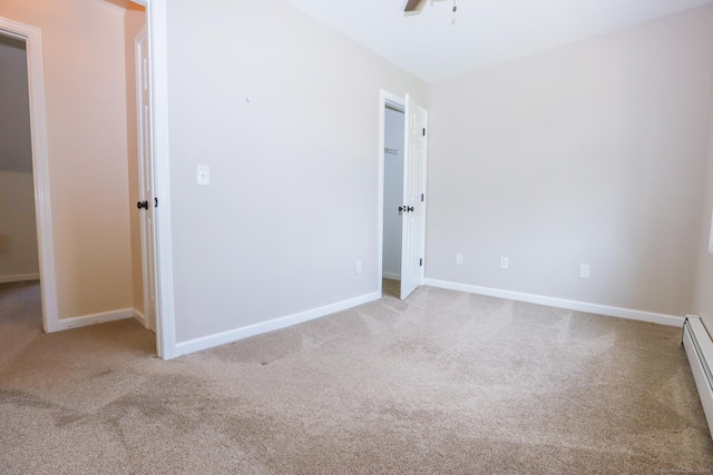 527 Highland Ave, Torrington, CT 06790 - spare room featuring light colored carpet, baseboards, and a ceiling fan