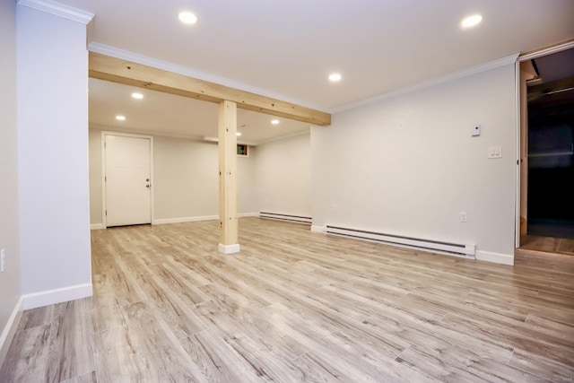 527 Highland Ave, Torrington, CT 06790 - finished below grade area featuring a baseboard heating unit, recessed lighting, light wood-style flooring, baseboards, and crown molding