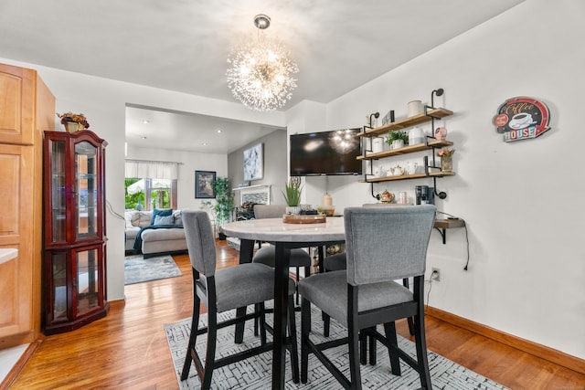 30 Hi Barlow Rd, Newtown, CT 06470 - dining space with a chandelier and light wood-style floors