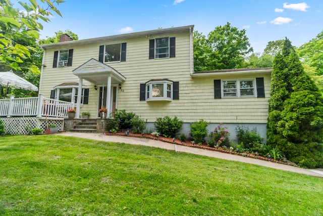 30 Hi Barlow Rd, Newtown, CT 06470 - colonial home featuring a chimney, a wooden deck, and a front yard