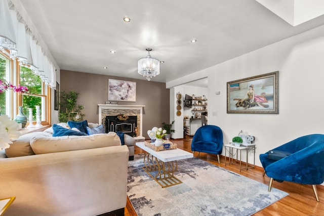 30 Hi Barlow Rd, Newtown, CT 06470 - living room featuring a chandelier, recessed lighting, wood finished floors, and a fireplace