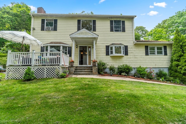 30 Hi Barlow Rd, Newtown, CT 06470 - view of front of property with a chimney, a deck, and a front yard