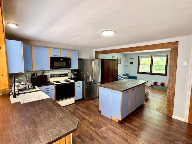 83 Shingle Mill Rd, Harwinton, CT 06791 - kitchen with white electric stove, black microwave, stainless steel fridge with ice dispenser, and dark countertops