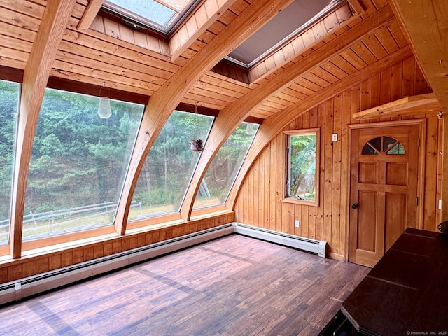 83 Shingle Mill Rd, Harwinton, CT 06791 - foyer entrance featuring a skylight, lofted ceiling, wood walls, wood finished floors, and wooden ceiling
