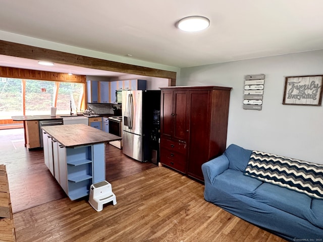 83 Shingle Mill Rd, Harwinton, CT 06791 - kitchen with stainless steel refrigerator with ice dispenser, electric stove, dark wood-style flooring, and open floor plan