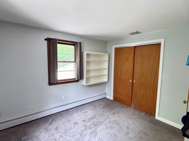 83 Shingle Mill Rd, Harwinton, CT 06791 - unfurnished bedroom featuring baseboard heating, carpet flooring, a closet, and baseboards