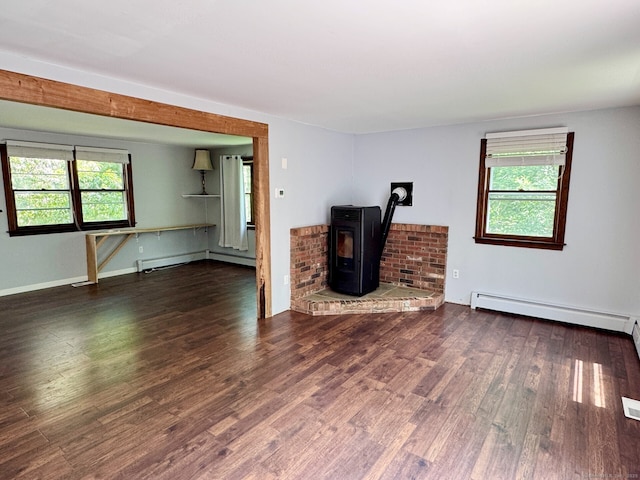 83 Shingle Mill Rd, Harwinton, CT 06791 - unfurnished living room with a baseboard heating unit, plenty of natural light, and a wood stove