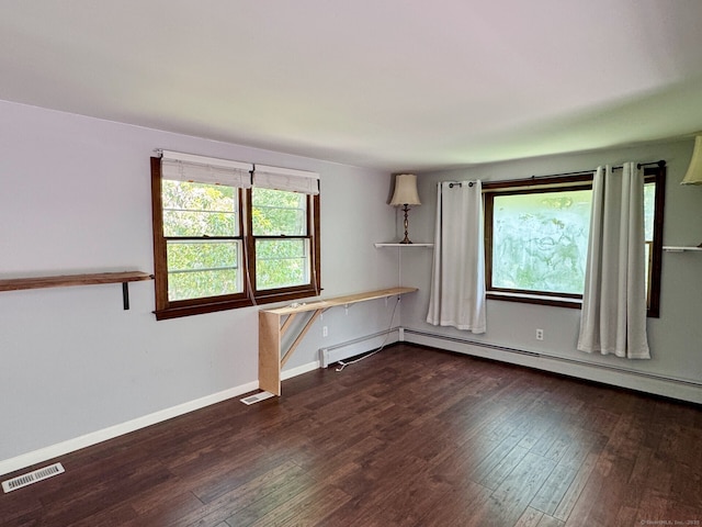 83 Shingle Mill Rd, Harwinton, CT 06791 - empty room with wood finished floors and a baseboard heating unit