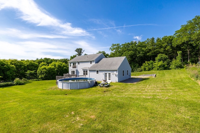 25 Cotton Bridge Rd, Killingly, CT 06241 - back of house with an outdoor pool and a lawn