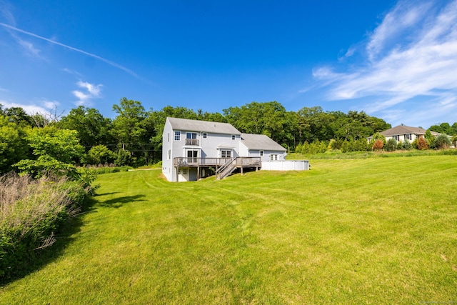 25 Cotton Bridge Rd, Killingly, CT 06241 - rear view of house featuring a deck, a yard, and stairway