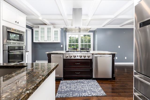 25 Cotton Bridge Rd, Killingly, CT 06241 - kitchen with stainless steel appliances, island range hood, dark wood-type flooring, beamed ceiling, and glass insert cabinets