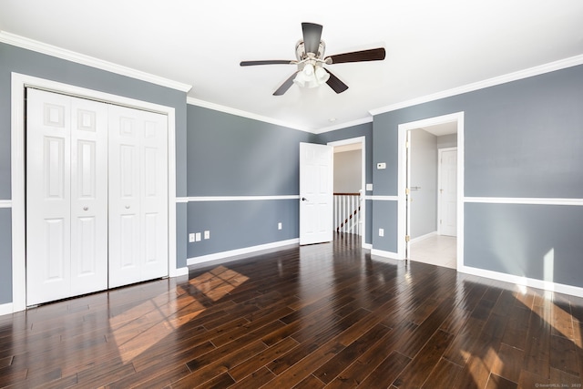 25 Cotton Bridge Rd, Killingly, CT 06241 - unfurnished bedroom featuring baseboards, wood finished floors, a closet, and crown molding