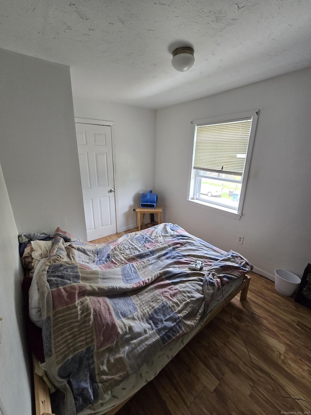 54 Lombard St, New Haven, CT 06513 - bedroom featuring wood finished floors and baseboards