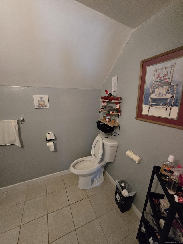 54 Lombard St, New Haven, CT 06513 - bathroom with vaulted ceiling, toilet, tile patterned floors, and baseboards