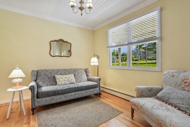 227 Meadow St, Shelton, CT 06484 - living area featuring a baseboard heating unit, a chandelier, ornamental molding, and wood finished floors