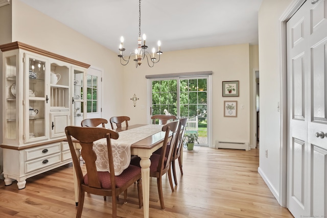 227 Meadow St, Shelton, CT 06484 - dining area featuring baseboard heating, light wood-type flooring, and a chandelier