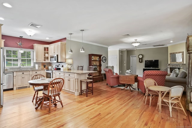 227 Meadow St, Shelton, CT 06484 - dining space with light wood-style floors, ornamental molding, and recessed lighting