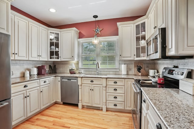 227 Meadow St, Shelton, CT 06484 - kitchen featuring stainless steel appliances, a sink, tasteful backsplash, recessed lighting, and decorative light fixtures