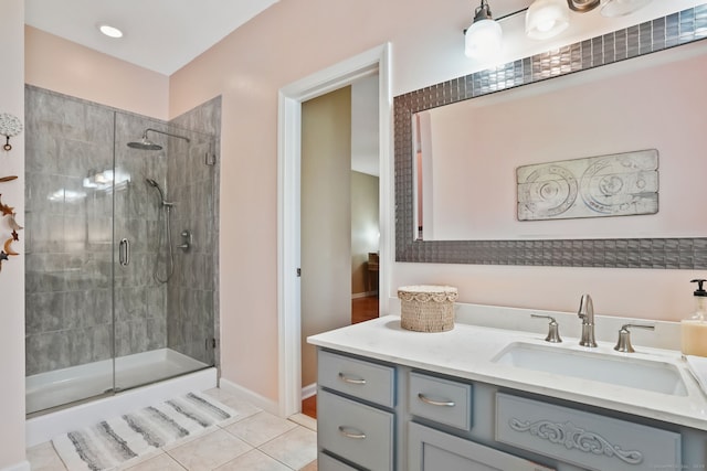 227 Meadow St, Shelton, CT 06484 - full bath with a stall shower, tile patterned flooring, vanity, and baseboards