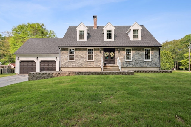 1 Spinnaker Rd, Waterford, CT 06385 - cape cod-style house featuring stone siding, an attached garage, a front lawn, a chimney, and driveway