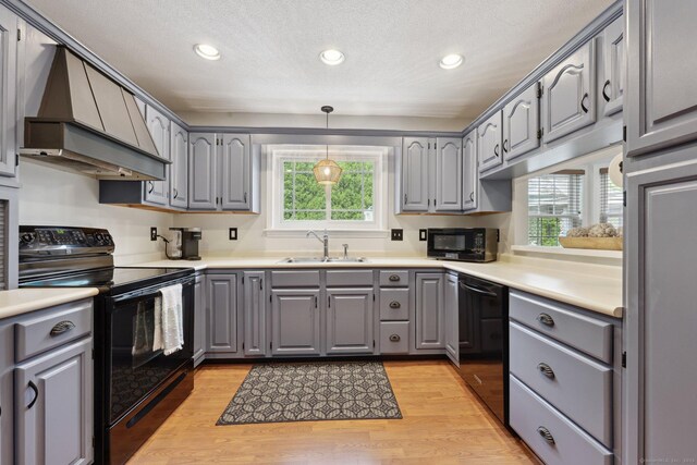 1 Spinnaker Rd, Waterford, CT 06385 - kitchen featuring gray cabinets, custom exhaust hood, black appliances, recessed lighting, and a textured ceiling